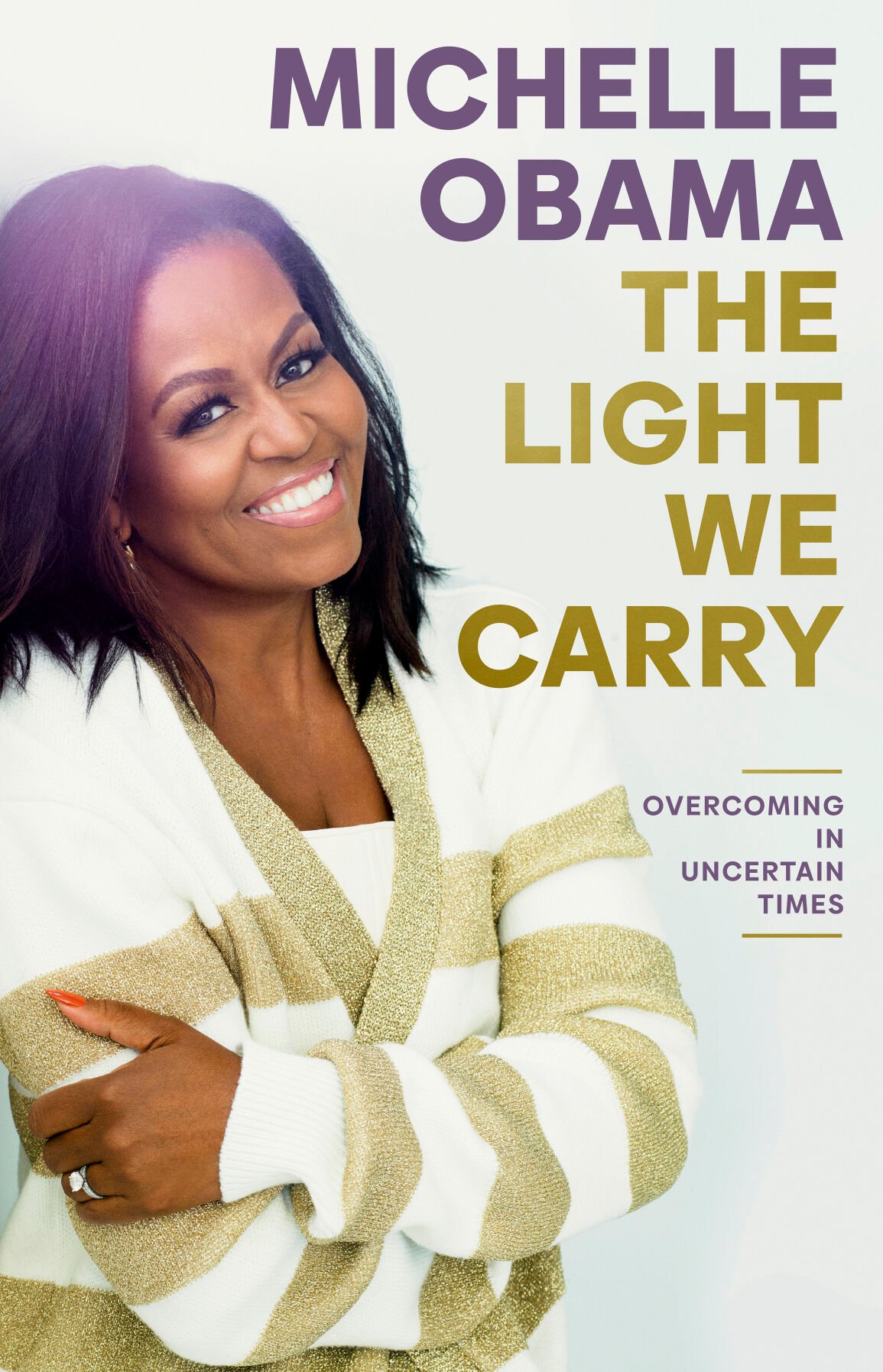 <p>This image released by Random House shows "The Light We Carry" by former first lady and author Michelle Obama. </p>