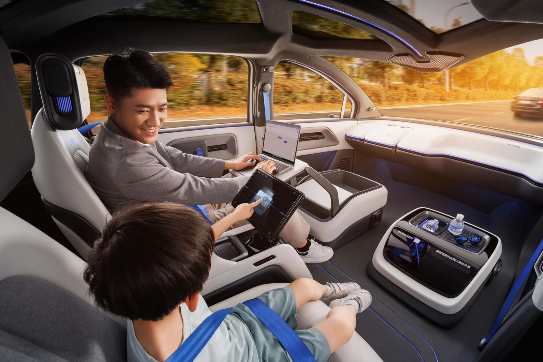 <p>A promotional shot from Baidu showing passengers looking at screens in the backseat of its new robotaxi vehicle.</p>