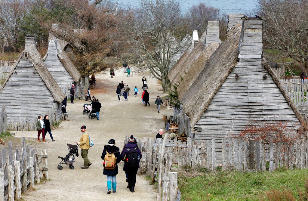 <p>HOLD FOR STORY BY PHIL MARCELO— Visitors walk through the 17th-Century English Village exhibit at the Plimoth Patuxet Museums on Nov. 18, 2018, in Plymouth, Mass. Native Americans in Massachusetts are calling for a boycott of a popular living history museum featuring colonial reenactors portraying life in Plymouth, the famous English settlement founded by Pilgrims arriving on the Mayflower. They say the Plimoth Patuxet museum hasn't lived up to its mandate to create a "bi-cultural museum" telling equally the stories of the European and indigenous communities. (AP Photo/Steven Senne, File)</p>