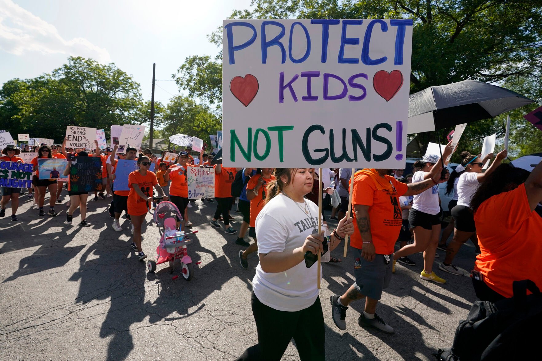 <p>Family and friends of those killed and injured in the school shootings at Robb Elementary take part in a protest march and rally July 10, 2022, in Uvalde, Texas.</p>