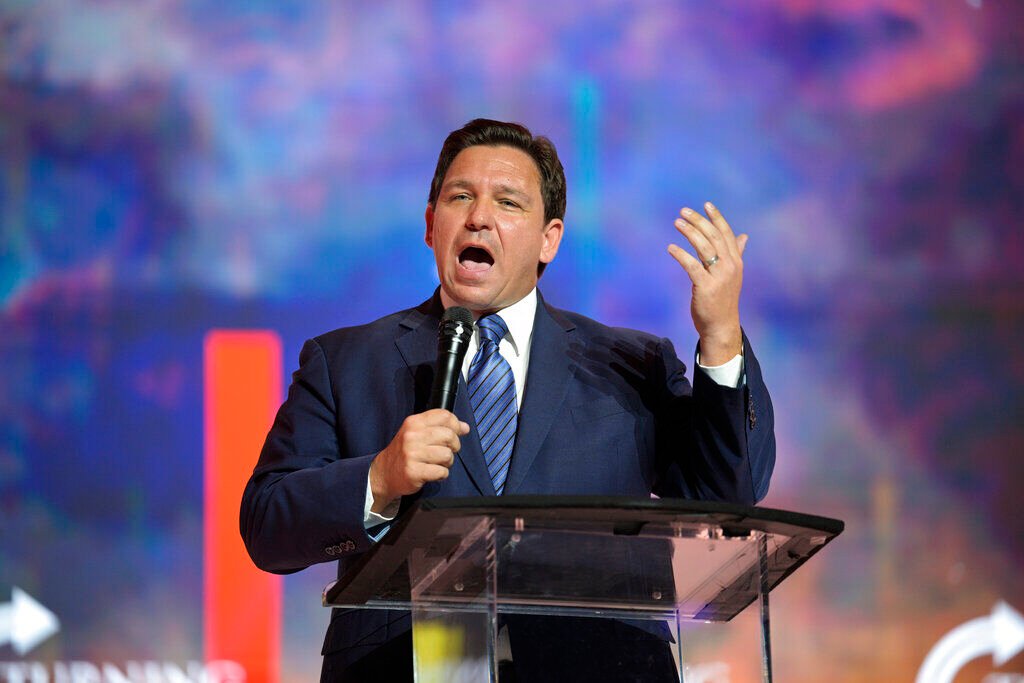 <p>FILE - Florida Gov. Ron DeSantis addresses attendees during the Turning Point USA Student Action Summit, Friday, July 22, 2022, in Tampa, Fla. </p>