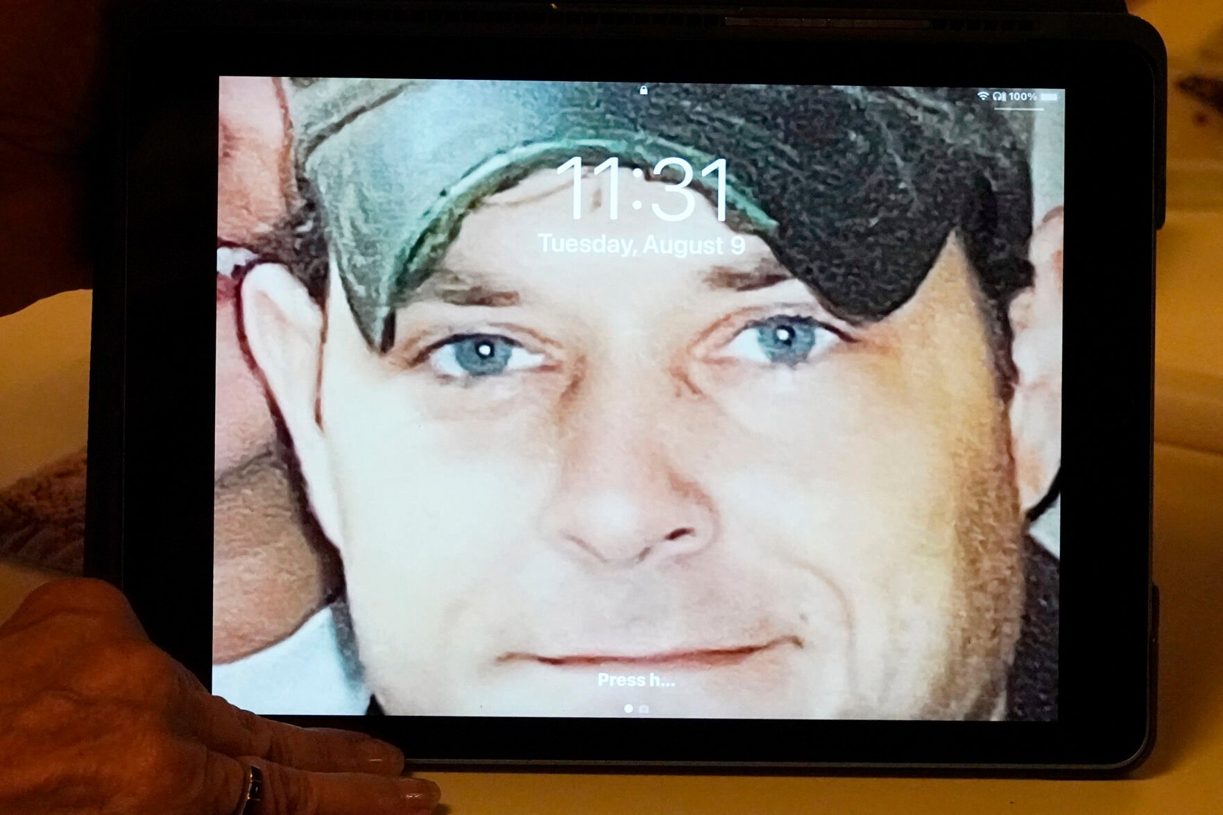 <p>Andrea Breedlove, a resident of the Carpenter community near Crystal Springs, Miss., says she awakens each morning to a snapshot of her late son, Chase Brewer, on her tablet, photographed Tuesday, Aug. 9, 2022. </p>