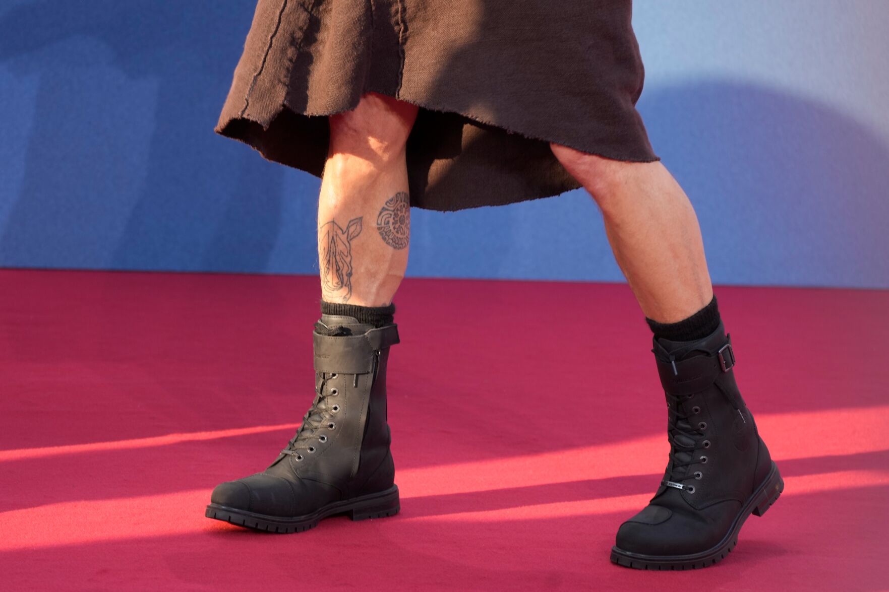 <p>Brad Pitt, center, arrives for the premiere of the film 'Bullet Train' at the Zoopalast in Berlin, Germany, Tuesday, July 19, 2022. (AP Photo/Markus Schreiber)</p>