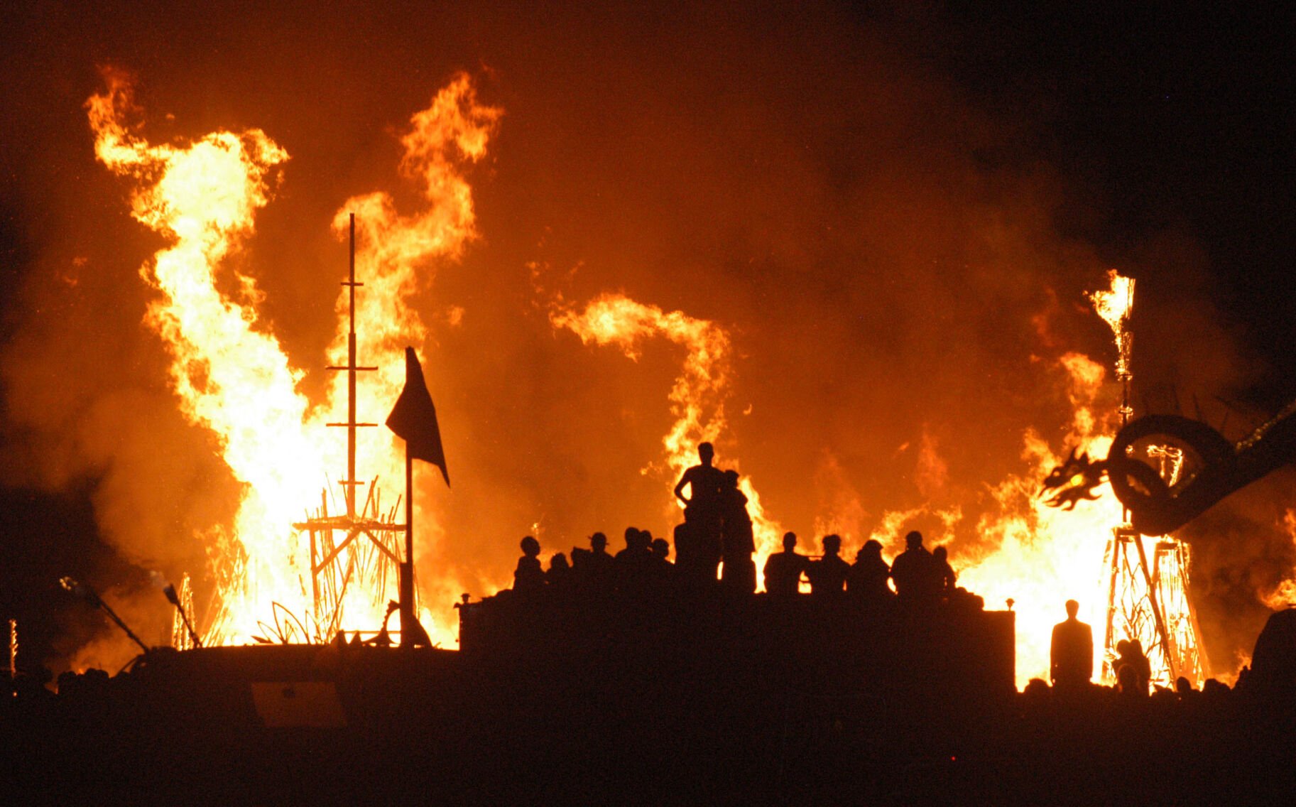 <p>The Temple of Hope, an art installation created by Mark Grieve, is set on fire Sunday, September 3, 2006, at the art festival in Nevada's Black Rock Desert. (AP Photo/Ron Lewis)</p>