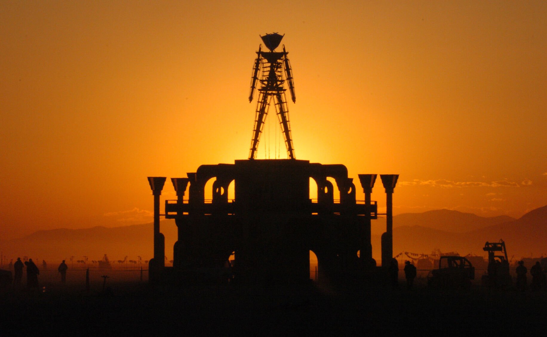 <p>A wooden effigy of a man is erected each year in Nevada's Black Rock Desert and later burned down. (AP Photo/Ron Lewis)</p>