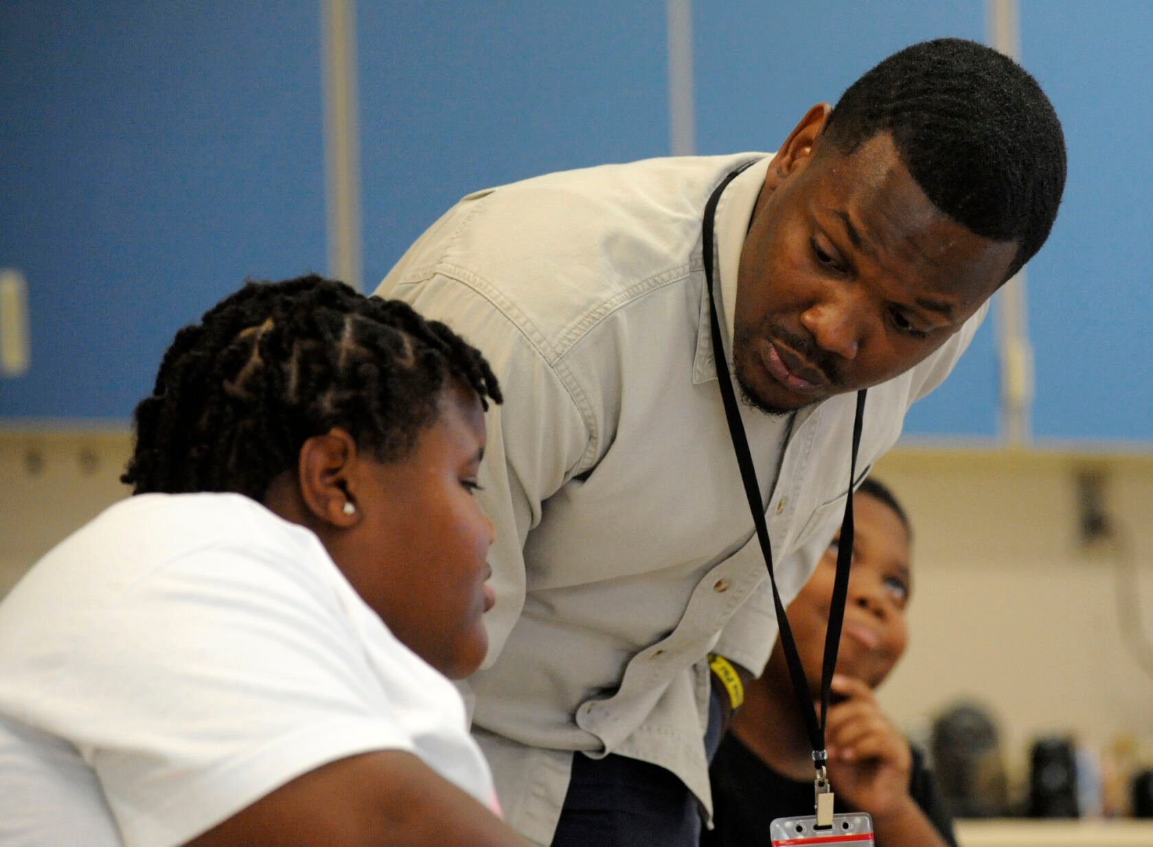 <p>Timothy Allison, a collaborative special education teacher in Birmingham, Ala., works with a student at Sun Valley Elementary School on Thursday, Sept. 8, 2022. The school district is struggling to fill around 50 teaching spots, including 15 in special education, despite ,000 signing bonuses for special education teachers. </p>