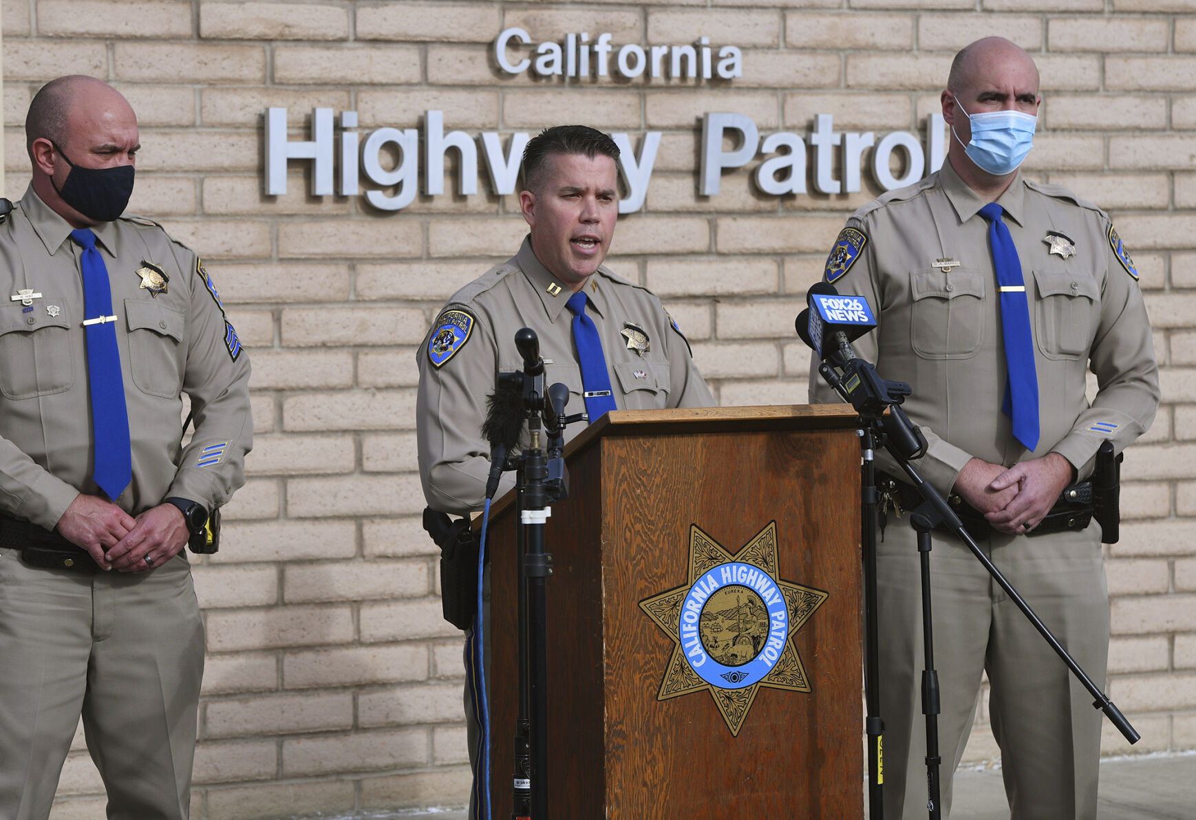 <p>FILE - California Highway Patrol Captain Kevin Clays, center, updates the media about Friday's fatal crash on Highway 33 on Saturday, Jan. 2, 2021 in Coalinga, Calif. Investigators said that the driver of an SUV involved in the crash was drunk and didn't have a license. The National Transportation Safety Board will use a final report on the crash to launch an effort to lobby for regulations requiring alcohol breath testing devices on all new vehicles. (Eric Paul Zamora//The Fresno Bee via AP)</p>