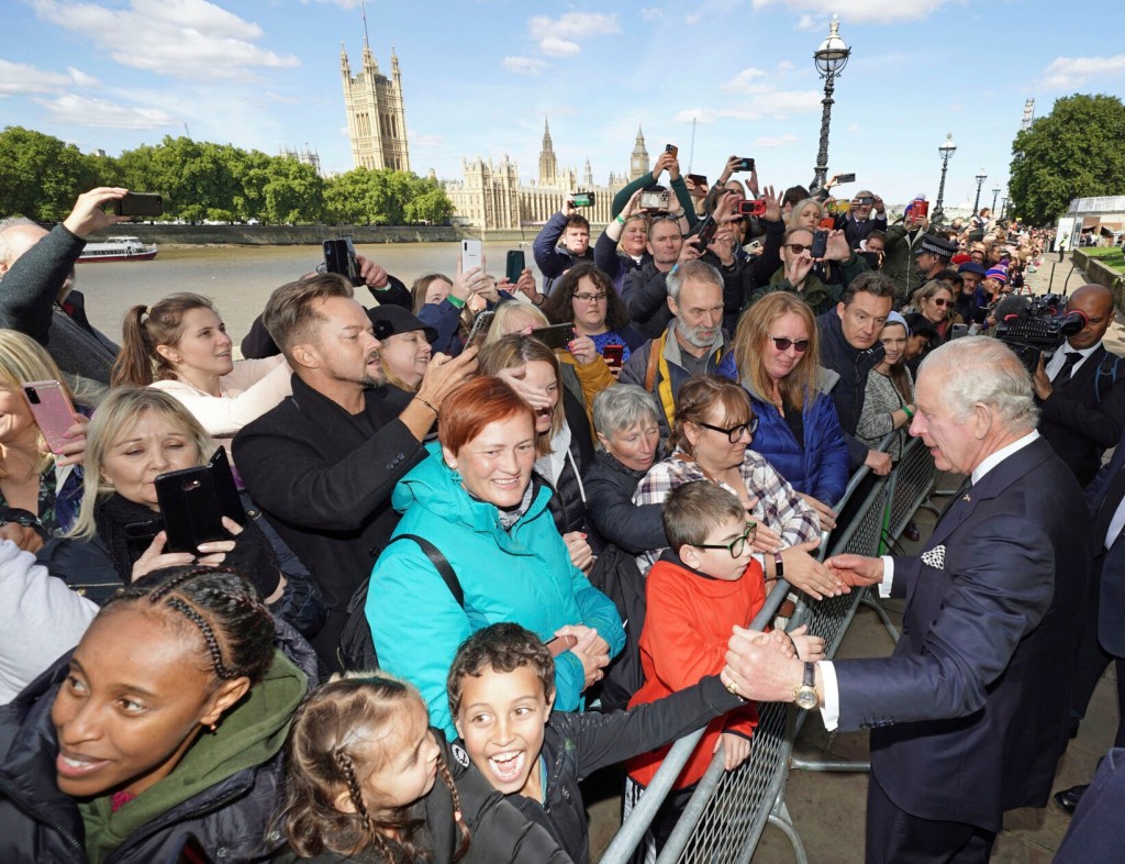 King Charles Makes Surprise Visit To Crowds Waiting In Line For Queen