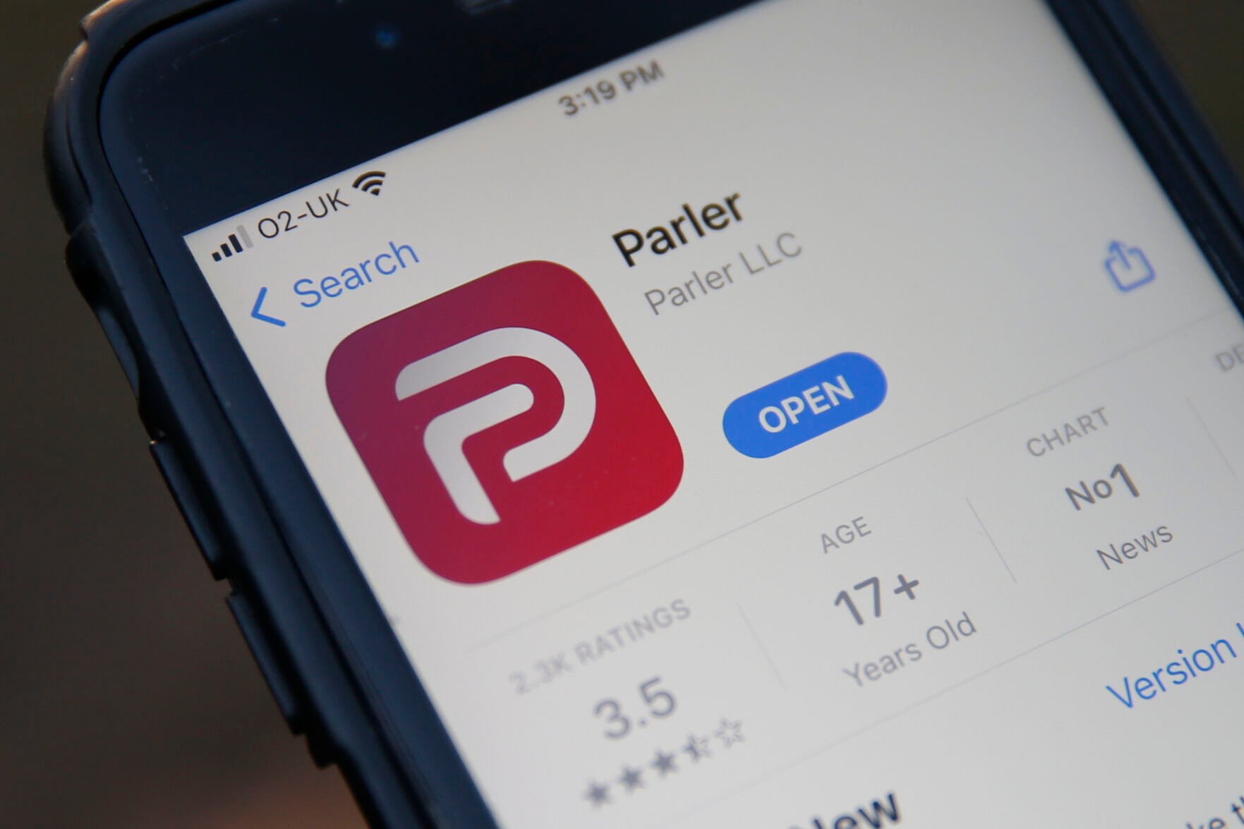 <p>The Parler logo on a smartphone. (Hollie Adams/Getty Images/TNS)</p>