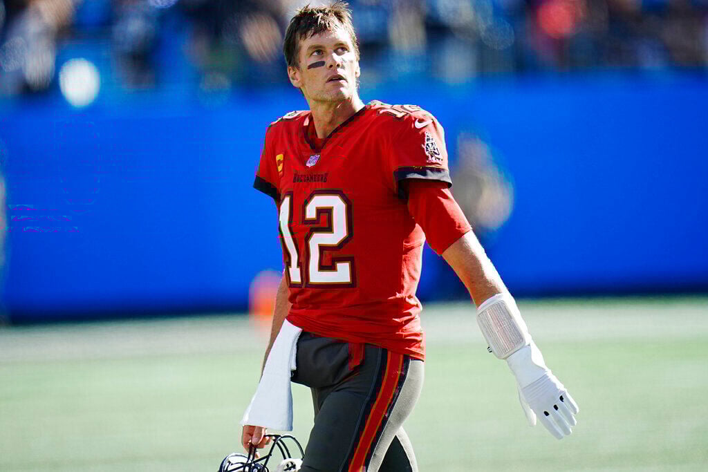 <p>Tampa Bay Buccaneers quarterback Tom Brady (12) looks at the scoreboard after failing to convert a fourth down play in the fourth quarter during the second half of an NFL football game against the Carolina Panthers Sunday, Oct. 23, 2022, in Charlotte, N.C. (AP Photo/Rusty Jones)</p>