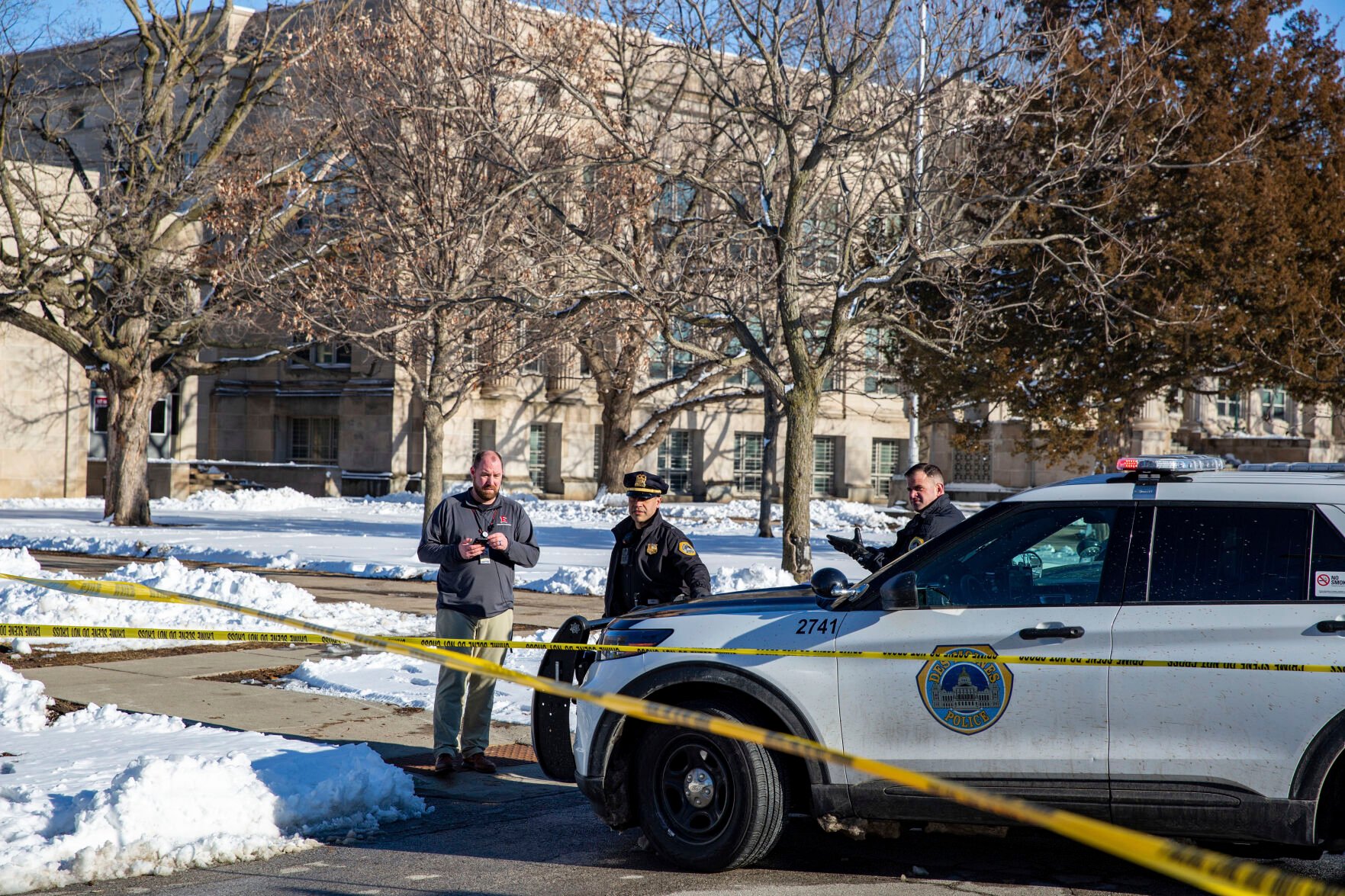 <p>FILE - Police investigate a shooting outside of East High School in in Des Moines, Iowa, on Monday, March 7, 2022. </p>