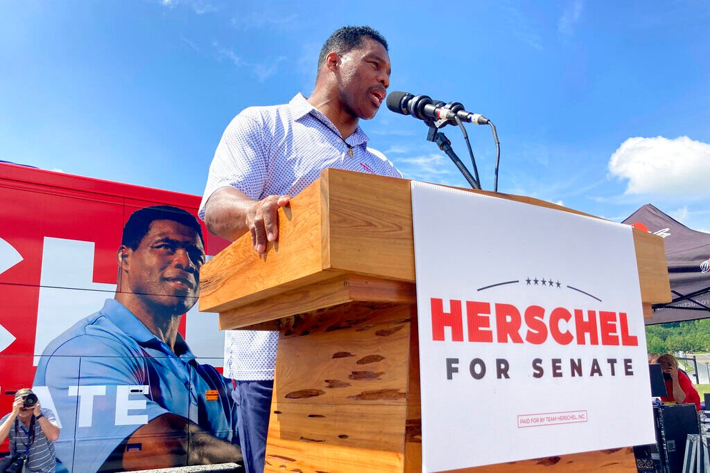 <p>Republican Senate nominee Herschel Walker campaigns Wednesday, Sept. 7, 2021, in Emerson, Georgia, north of Atlanta. </p>