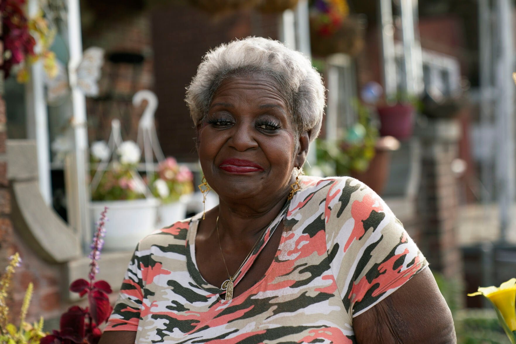 <p>Pamela Jackson-Walters sits outside her home in Detroit, Wednesday, Sept. 21, 2022. </p>