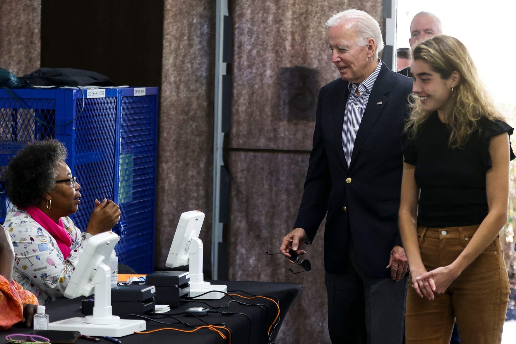 <p>President Joe Biden arrives to cast his vote during early voting for the 2022 U.S. midterm elections with his granddaughter Natalie Biden, a first-time voter, at a polling station in Wilmington, Del., Saturday, Oct. 29, 2022.</p>