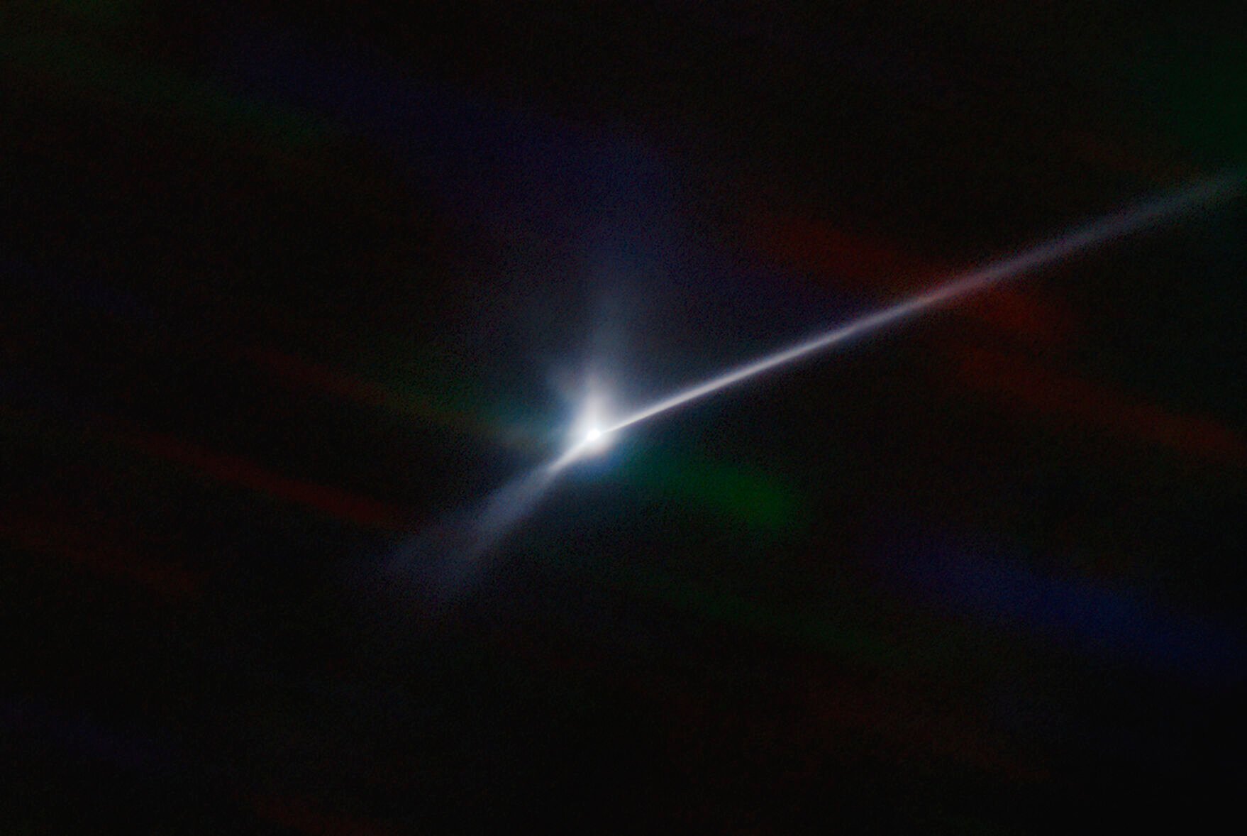 <p>This image made available by NOIRLab shows a plume of dust and debris blasted from the surface of the asteroid Dimorphos by NASA's DART spacecraft after it impacted on Sept. 26, 2022, captured by the U.S. National Science Foundation's NOIRLab's SOAR telescope in Chile. The expanding, comet-like tail is more than 6,000 miles (10,000 kilometers) long. (Teddy Kareta, Matthew Knight/NOIRLab via AP)</p>