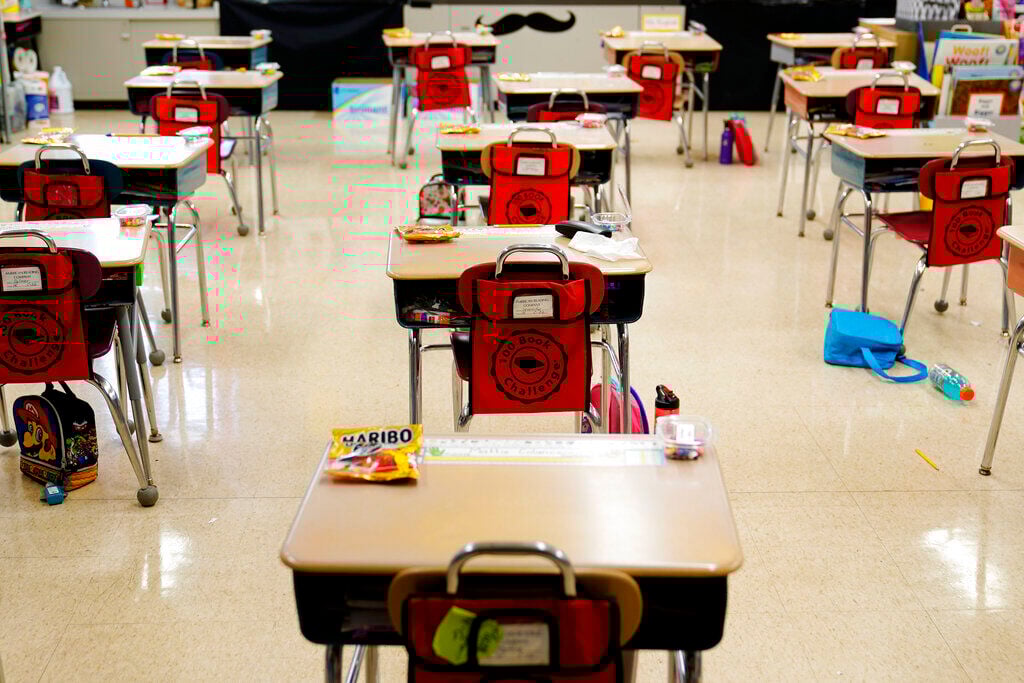 <p>FILE - Desks are arranged in a classroom at an elementary school in Nesquehoning, Pa., March 11, 2021. </p>