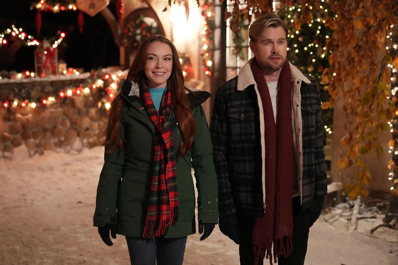 <p>Lindsay Lohan, left, and Chord Overstreet in "Falling for Christmas." (Scott Everett White/Netflix/TNS)</p>