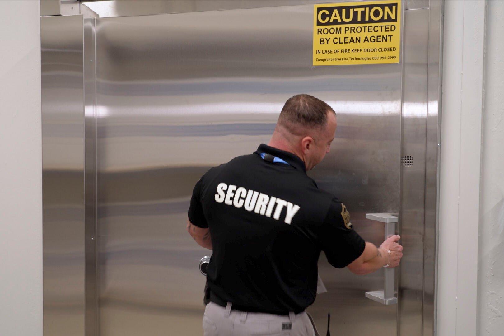 <p>A security guard opens a steel door leading into a vault containing hundreds of collectibles at Collectors Vault, a new company that is making it easier for collectors to store and trade memorabilia, on Oct. 21, 2022, in Delaware. The door is nearly two feet thick and is meant to protect the valuables from harm and thieves.</p>