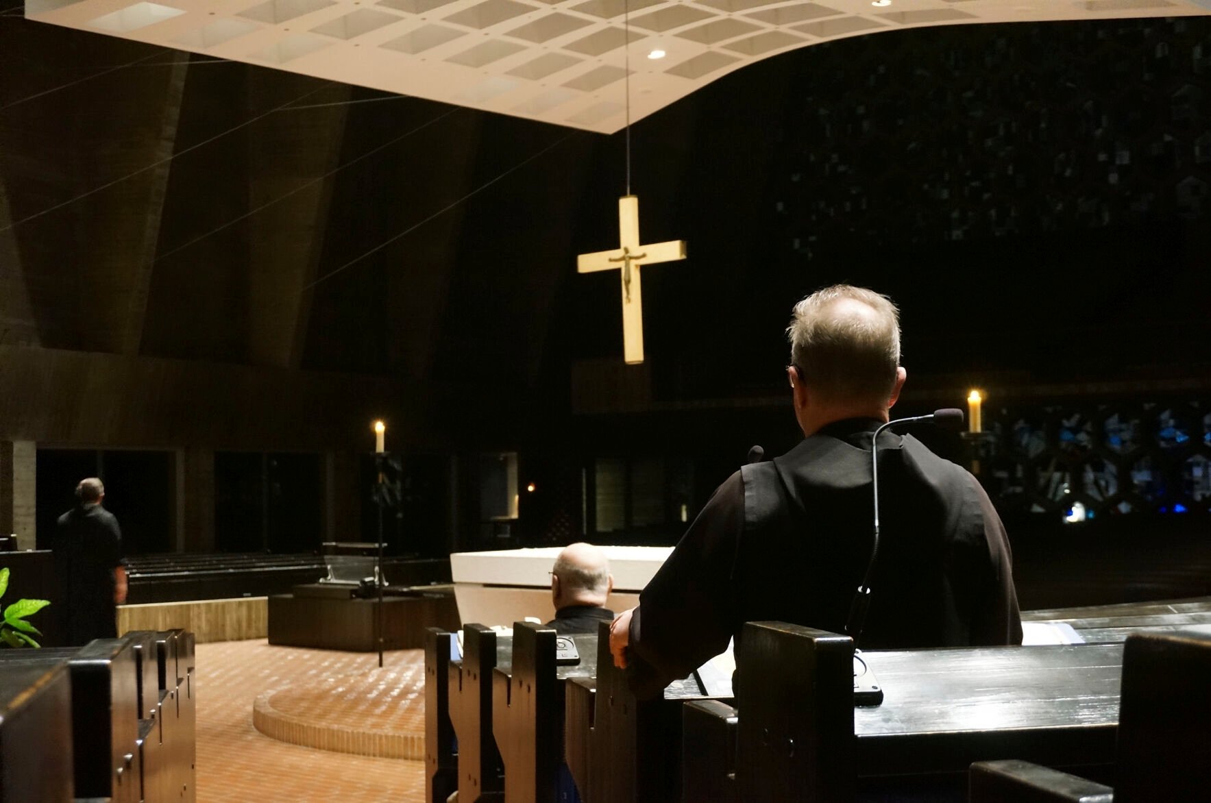 <p>Benedictine monks gather for evening prayers in the mid-20th century church next to their abbey on the campus of Saint John's University in Collegeville, Minnesota, on Tuesday, Nov. 8, 2022. </p>