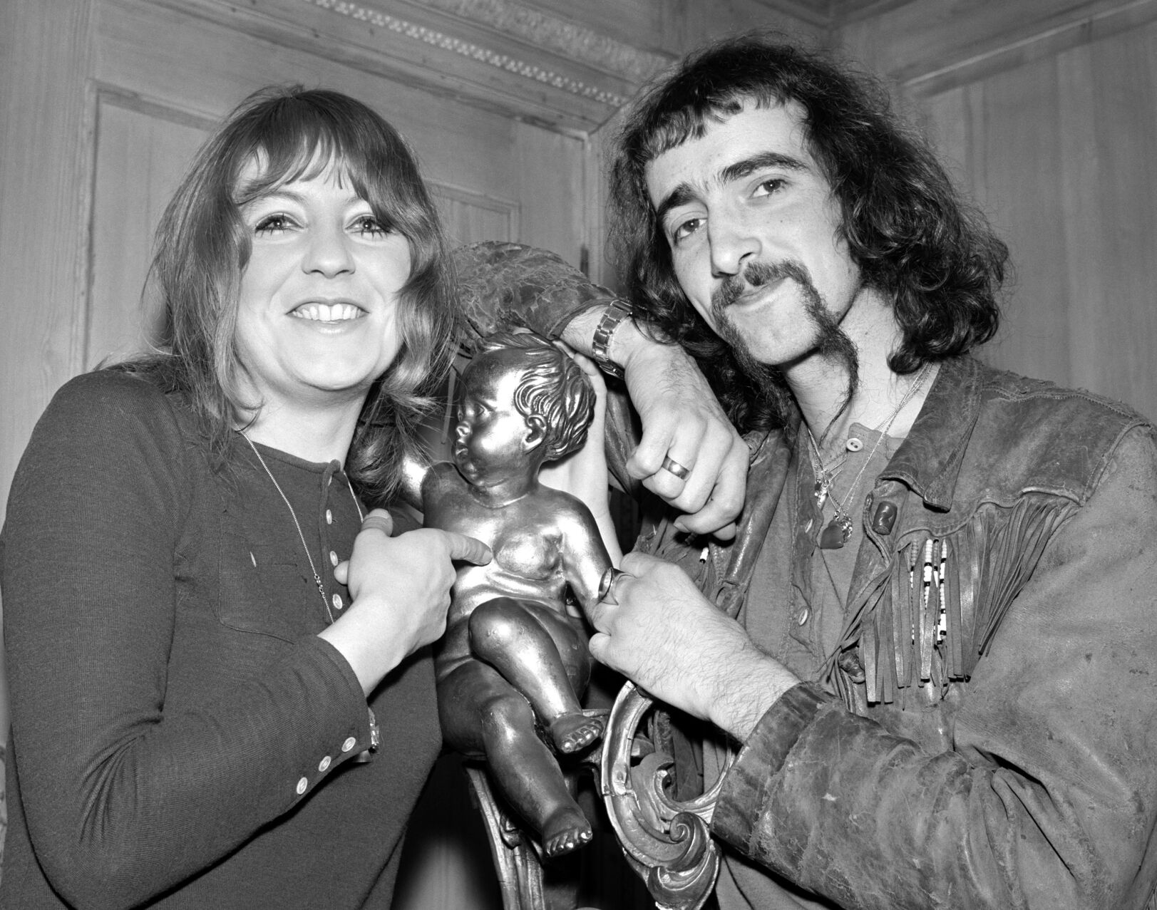 <p>FILE - Bass guitarist John McVie, of the Fleetwood Mac pop group, right, and Christine Perfect of the Chicken Shack Group appear at a party for Fleetwood Mac, in London, on Feb. 20, 1969. Christine McVie, the soulful British musician who sang lead on many of Fleetwood Mac’s biggest hits, has died at 79. The band announced her death on social media Wednesday.</p>