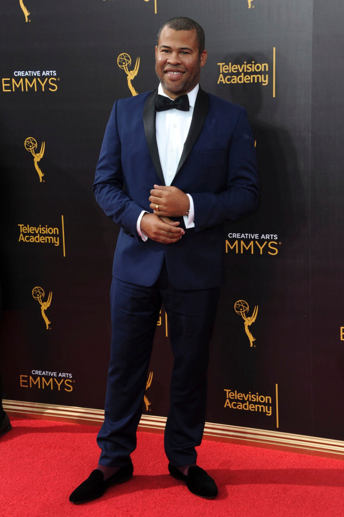 <p>FILE - Jordan Peele arrives at night two of the Creative Arts Emmy Awards on Sunday, Sept. 11, 2016, in Los Angeles. Parties are back, and they've brought with them the potential for some dress code chaos. White tie, black tie, black tie creative/festive, semi-formal. Pre-pandemic guidelines for attire in an exhausted world more used to sweats and sneakers may take some extra re-entry energy. (Photo by Richard Shotwell/Invision/AP, File)</p>