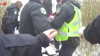 Watch Now: Ukraine Police Officer Rescues Woman And Dog From Frozen Pond In Kyiv