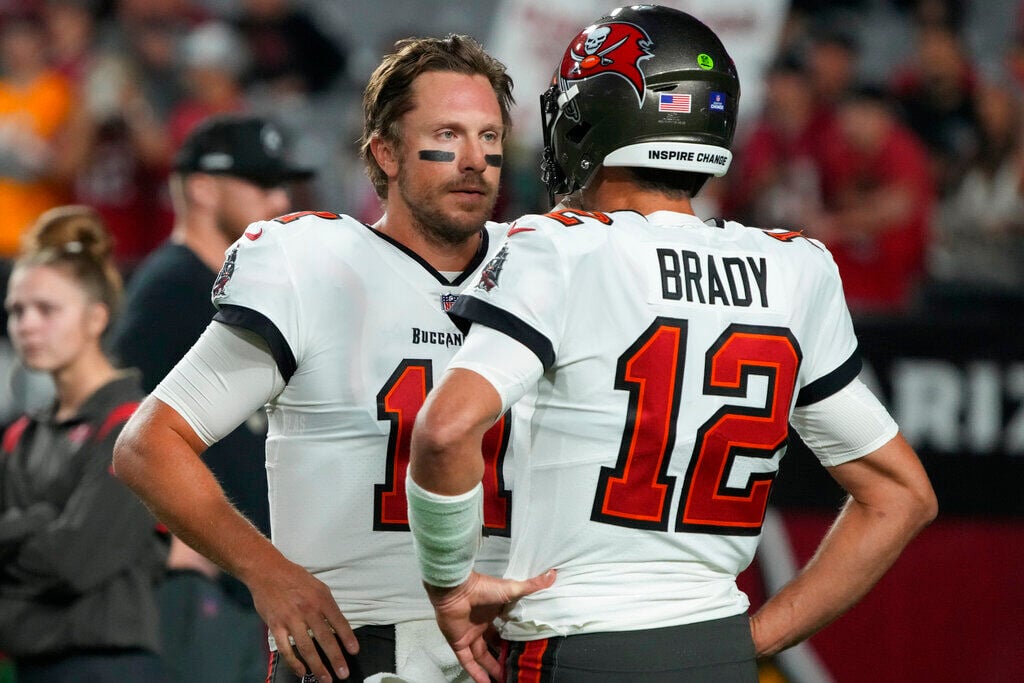 <p>Tampa Bay Buccaneers quarterback Blaine Gabbert (11) and Tom Brady (12) during the second half of an NFL football game against the Arizona Cardinals, Sunday, Dec. 25, 2022, in Glendale, Ariz. </p>