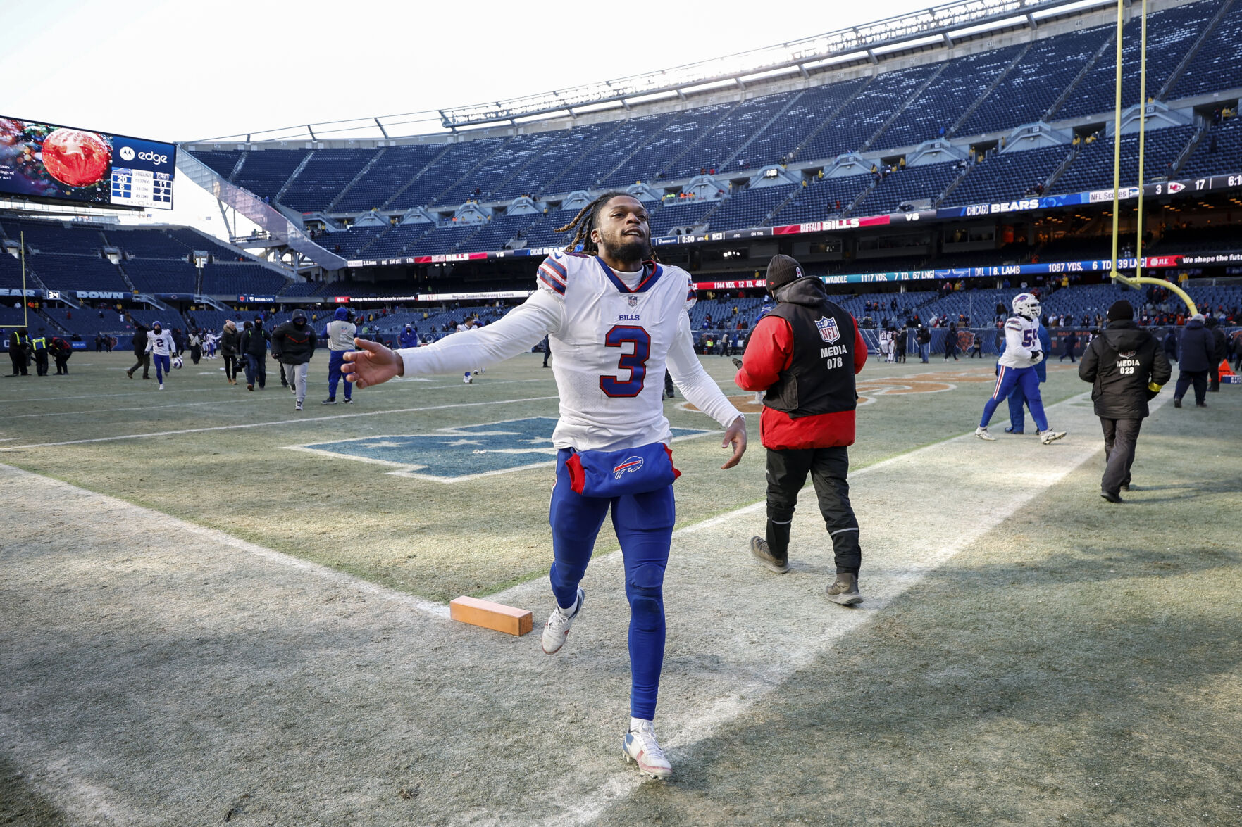<p>Buffalo Bills safety Damar Hamlin (3) runs off the field after an NFL football game against the Chicago Bears, Saturday, Dec. 24, 2022, in Chicago. </p>