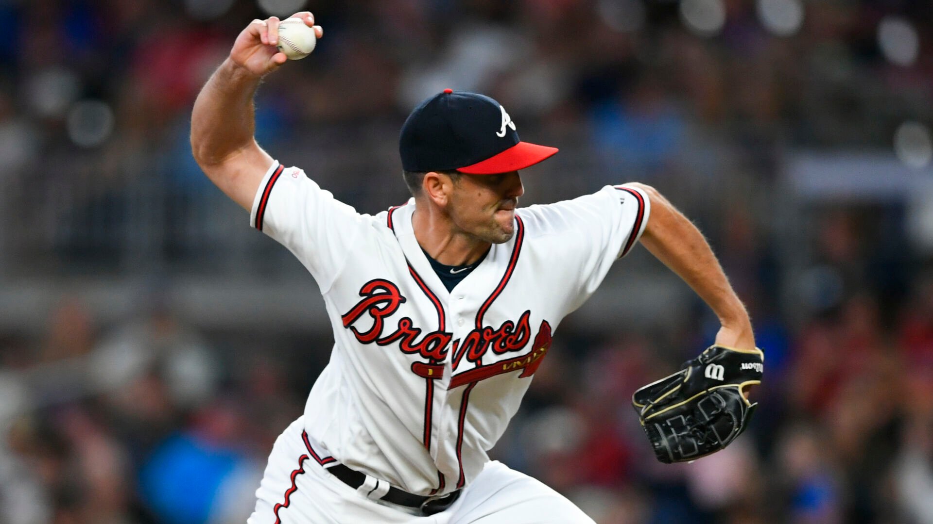 <p>Atlanta Braves pitcher Darren O'Day works against the San Francisco Giants during a 2019 game in Atlanta. </p>