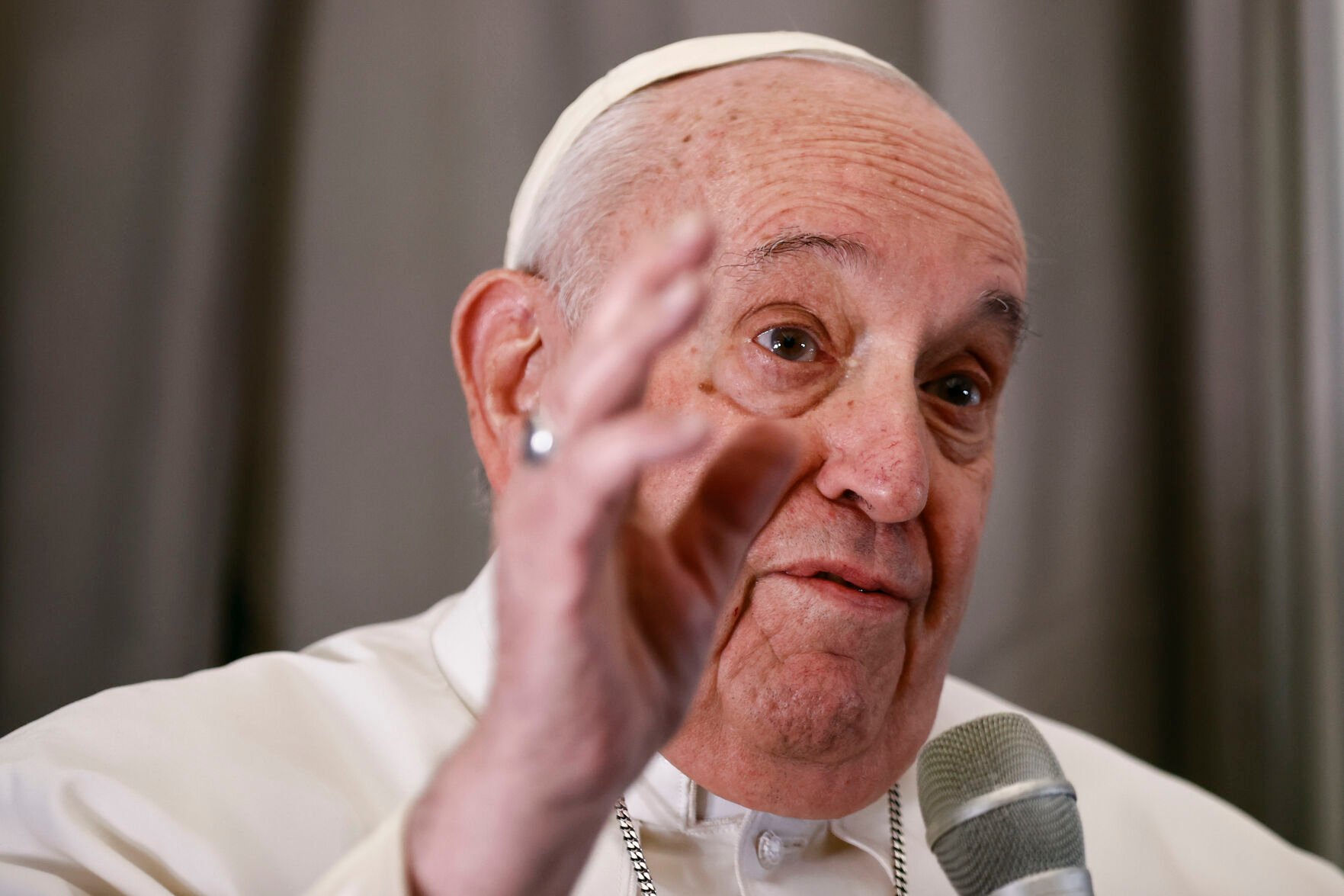 <p>Pope Francis talks to journalists Tuesday aboard his flight to Kinshasa, Democratic Republic of the Congo.</p>