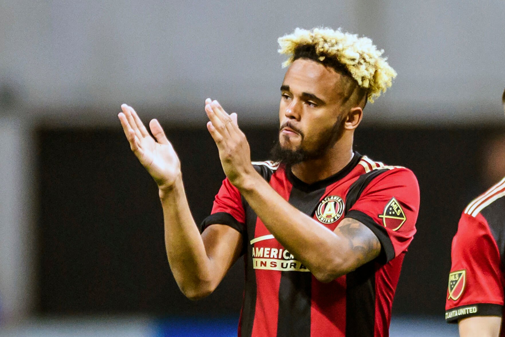 <p>FILE - Atlanta United midfielder Anton Walkes (26) acknowledges the fans after an MLS playoff soccer game against Columbus Crew, in Atlanta, Thursday, Oct. 26, 2017. </p>