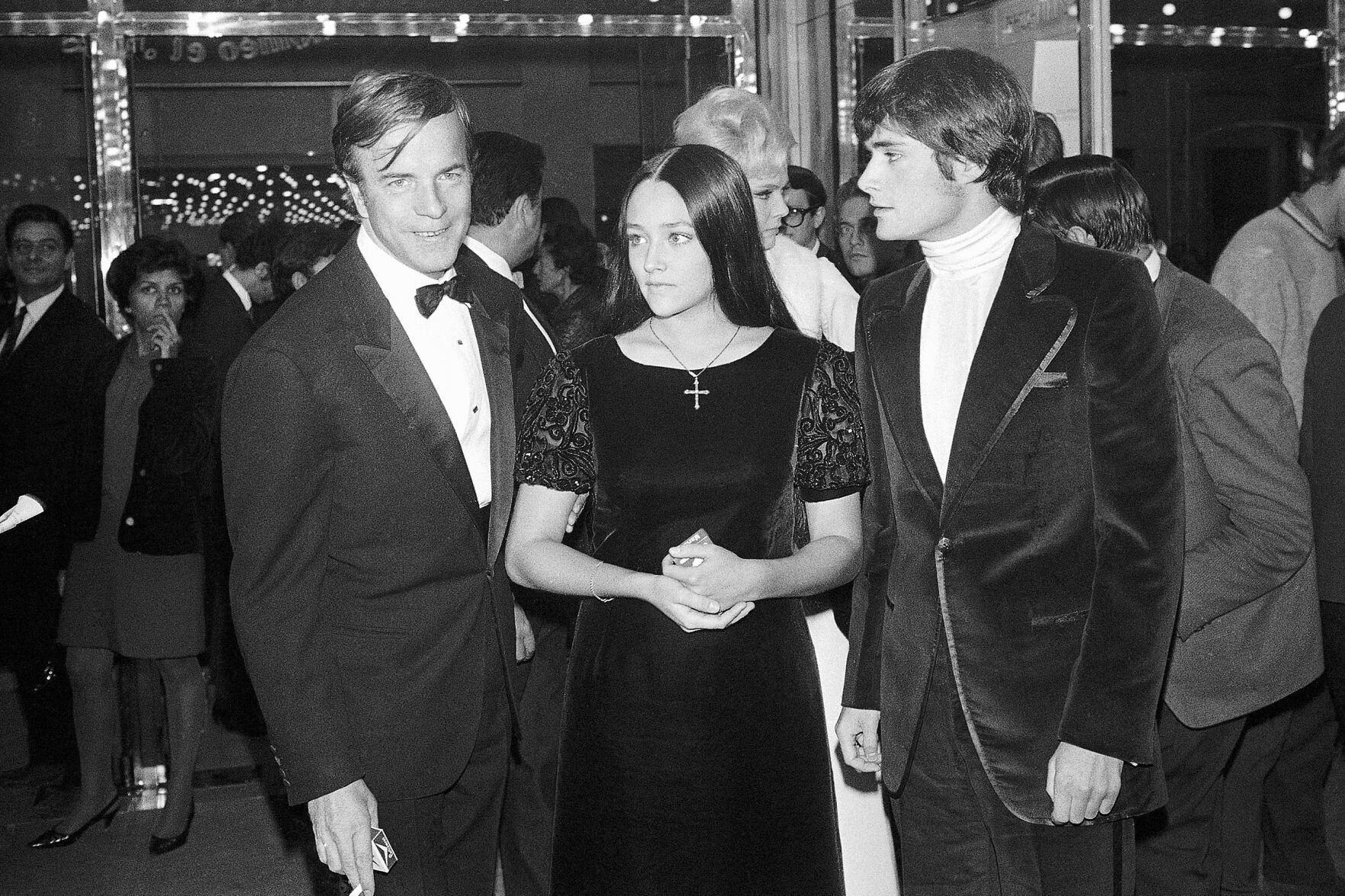 <p>FILE - "Romeo and Juliette" movie director Franco Zeffirelli, left, actors Olivia Hussey, center, and Leonard Whiting are seen after the Parisian premiere of the film in Paris on Sept. 25, 1968. </p>