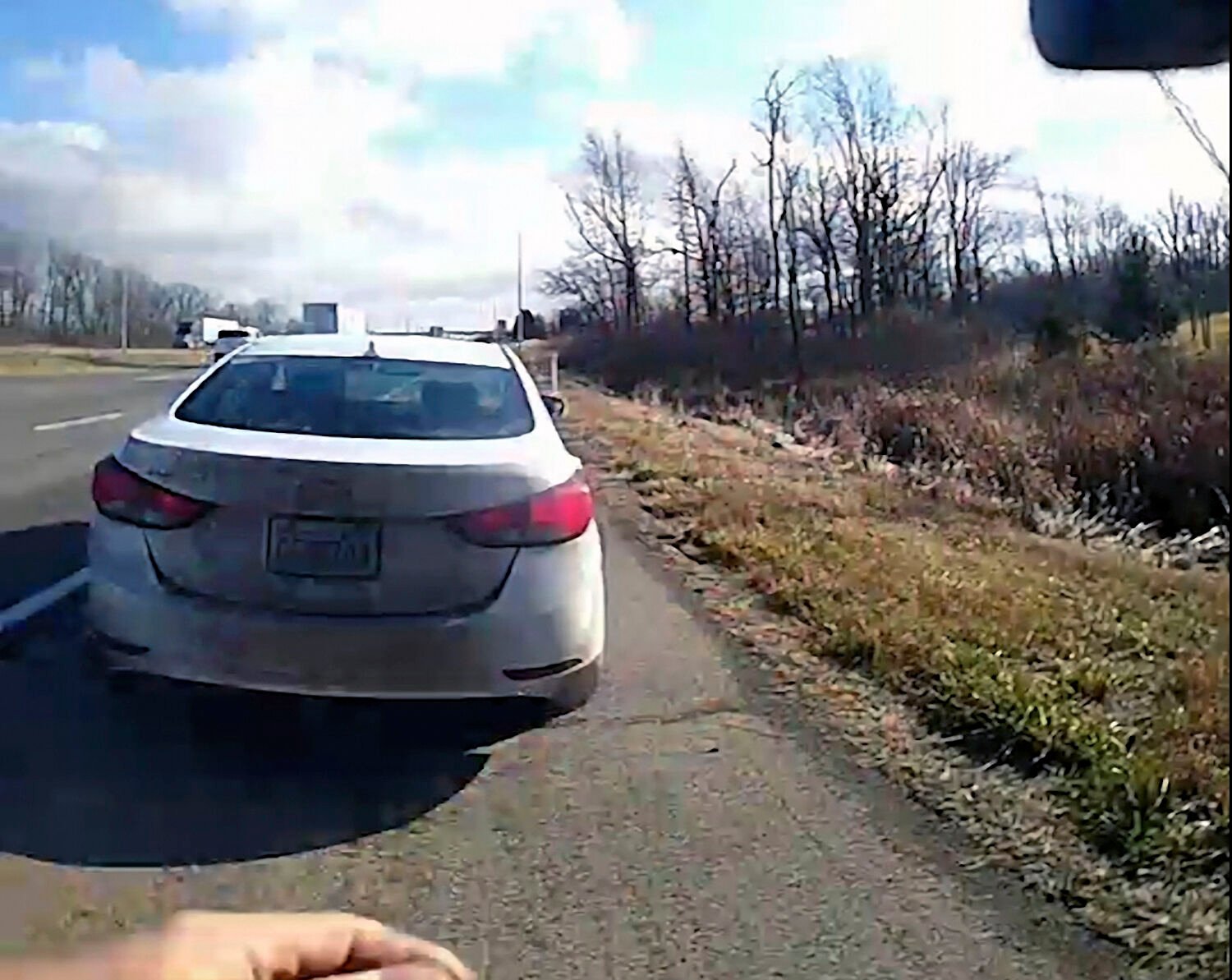 <p>In this image from a bodycam video provided by the Hancock County Sheriff's Office, a white Hyundai Elantra occupied by Bryan Kohberger and his father is seen on a deputy’s body camera video during a traffic stop on Thursday, Dec. 15, 2022, in Hancock County, Ind. </p>