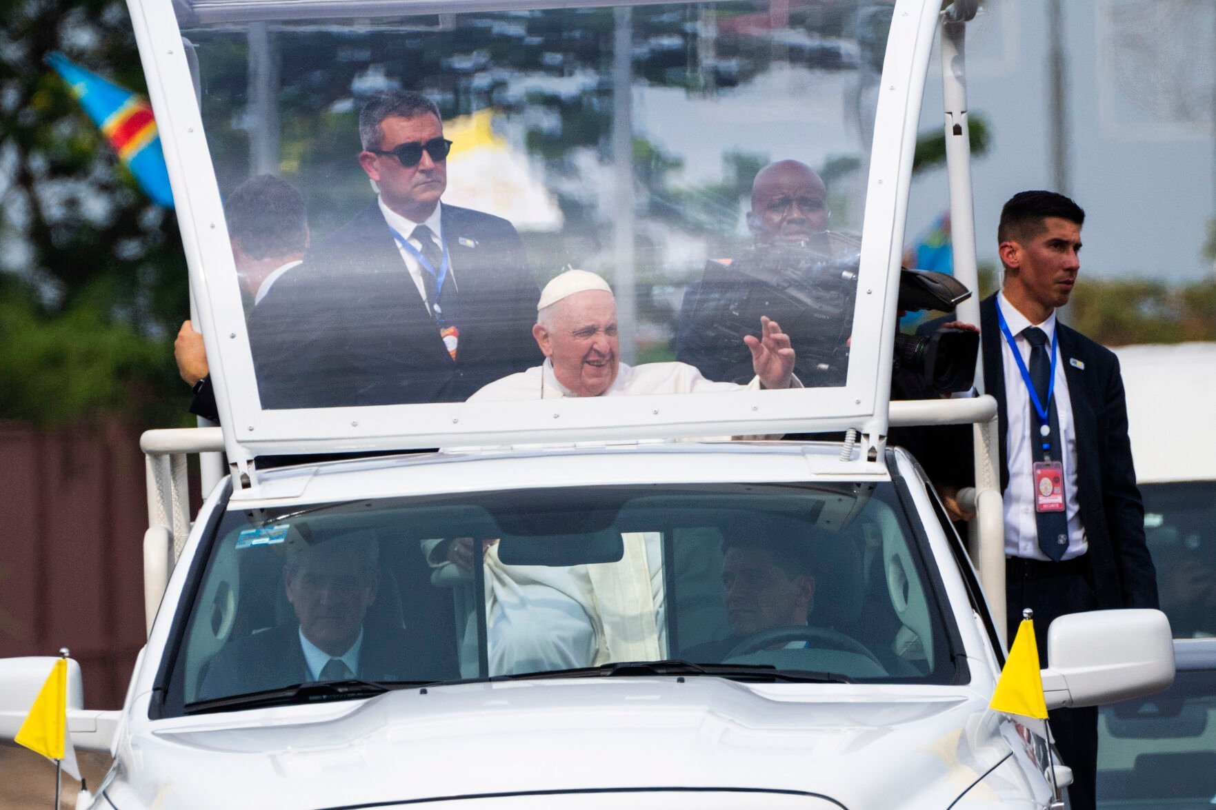 <p>Pope Francis greets well-wishers Tuesday after arriving in Kinshasa, Congo.</p>