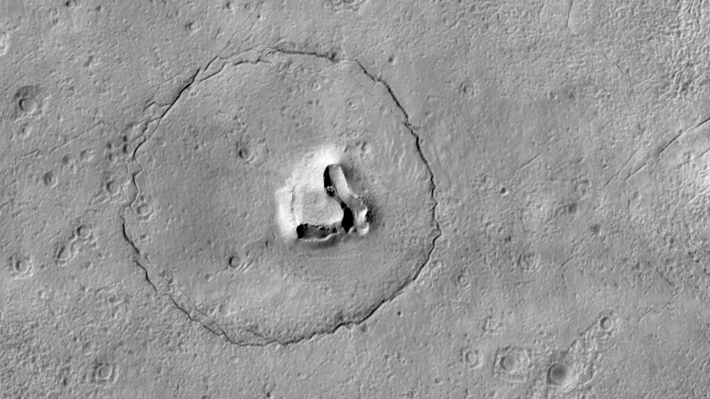 Nasa Orbiter Captures Image Of A Bear’s Face On Mars
