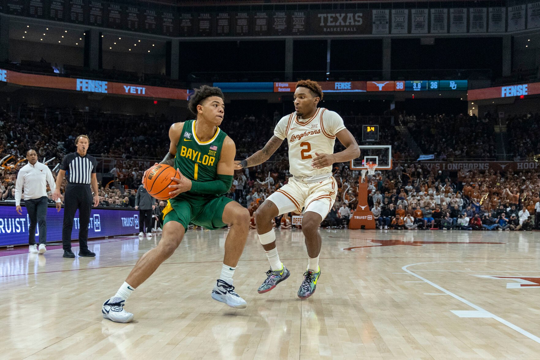 <p>Baylor guard Keyonte George looks to shoot as Texas guard Arterio Morris defends during the first half of Monday's game in Austin, Texas.</p>