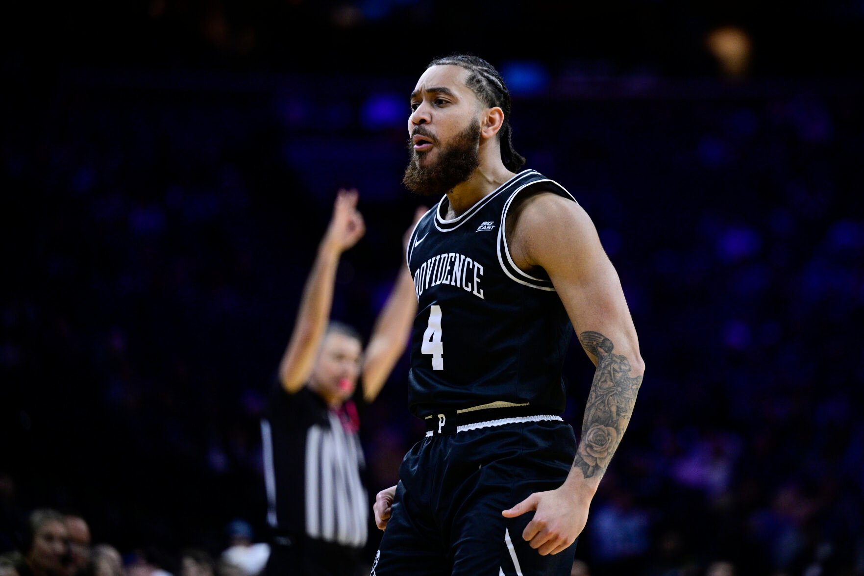 <p>Providence's Jared Bynum reacts after a three-point basket during the second half of Sunday's game against Villanova in Philadelphia.</p>