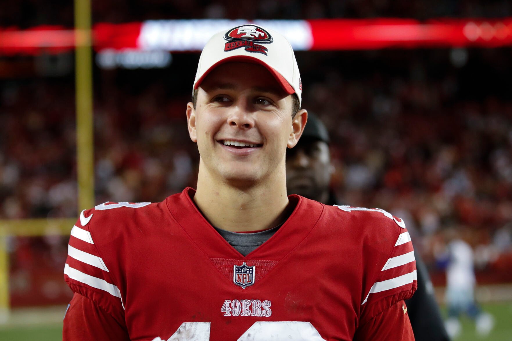 <p>San Francisco 49ers quarterback Brock Purdy smiles after his team's NFC divisional playoff game, last Sunday, in Santa Clara, Calif.</p>