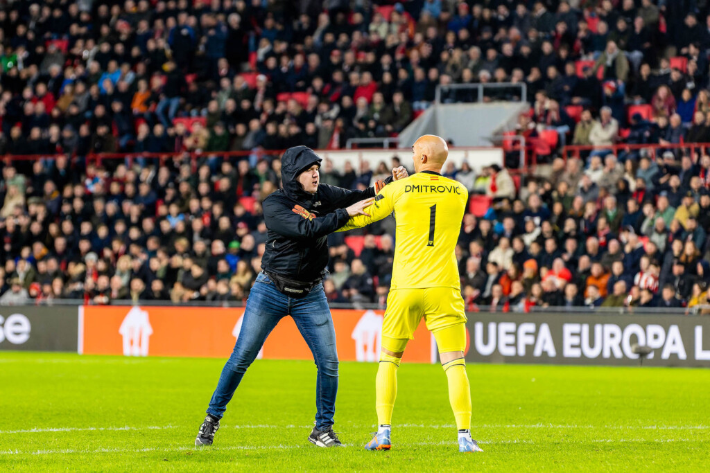 Sevilla Goalkeeper Marko Dmitrović Punched By Pitch Invader During Europa League Match At Psv Eindhoven