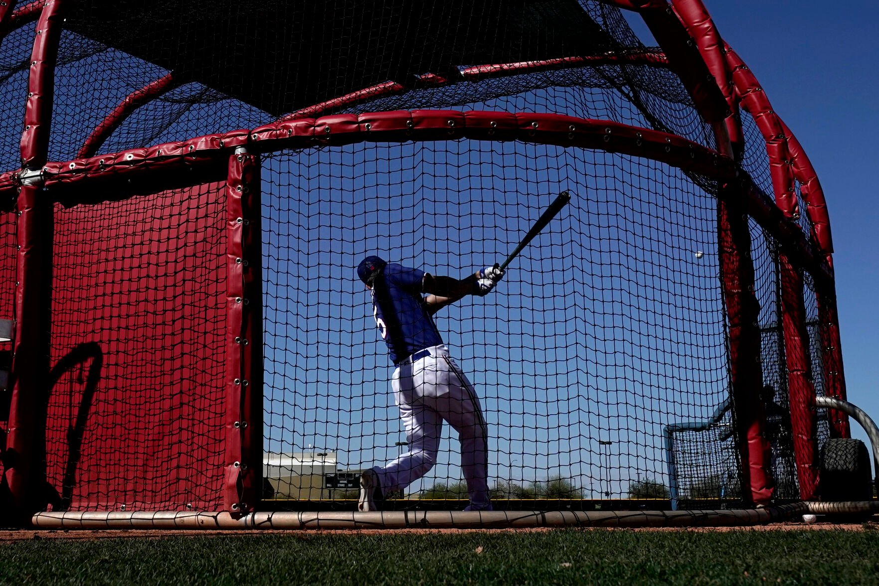 <p>Texas Rangers' Corey Seager bats during spring training practice on Monday in Surprise, Ariz.</p>