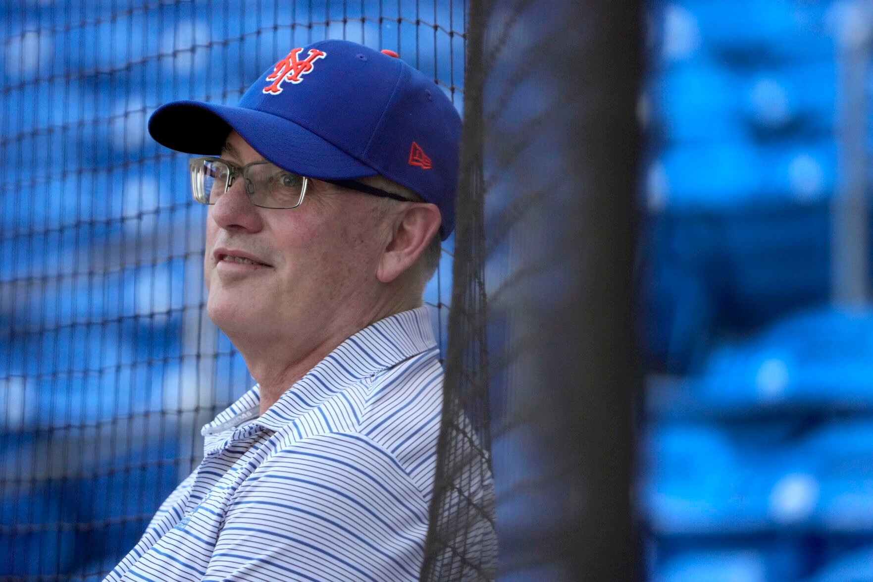 <p>New York Mets owner Steve Cohen watches his team during spring training on Monday in Port St. Lucie, Fla.</p>
