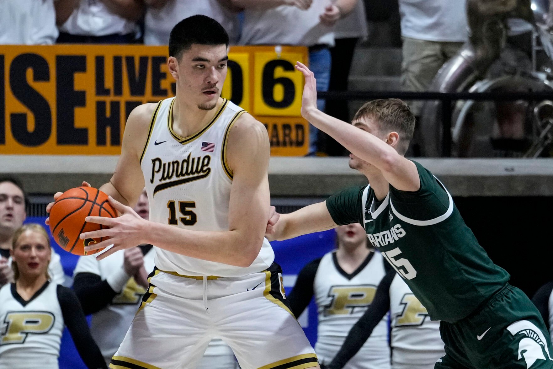 <p>Purdue center Zach Edey is defended by Michigan State center Carson Cooper during their game in West Lafayette, Ind., last Sunday.</p>