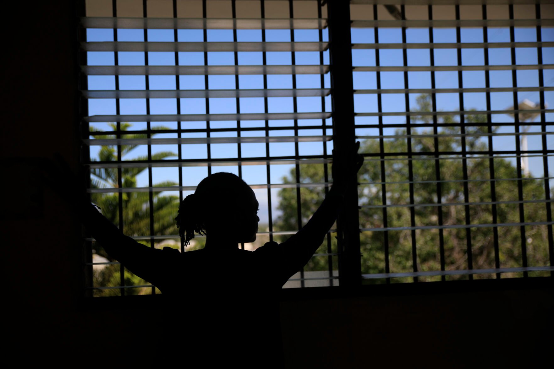 <p>A woman who did not want to give her name for fear of retaliation poses for a photo during an interview on Jan. 20 at a clinic near Port-au-Prince, Hait. The 36-year-old sent her two children to live with family in another part of the city after her husband was kidnapped and killed. Later, the men gang-raped her and forced her to flee her home.</p>