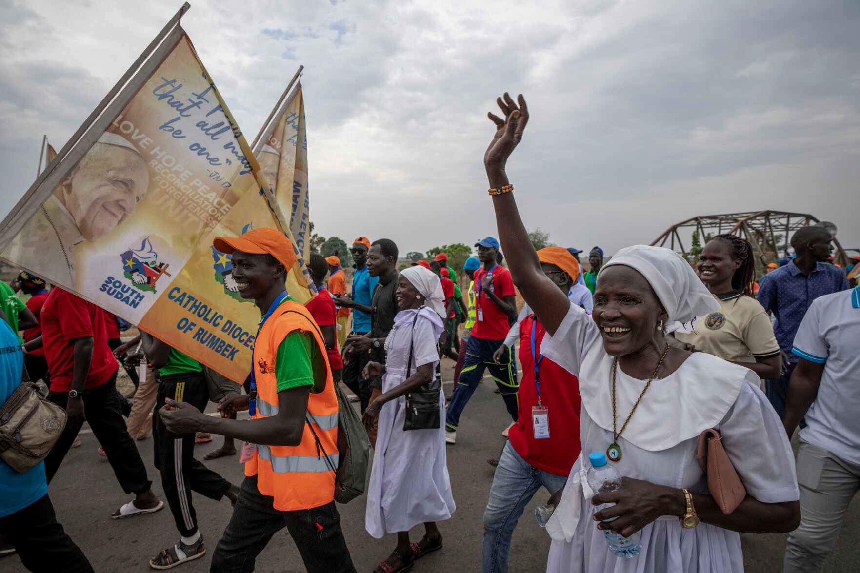 <p>A group of the Catholic faithful from the town of Rumbek cheer Thursday as they arrive after walking for more than a week to reach the capital for the visit of Pope Francis, in Juba, South Sudan.</p>