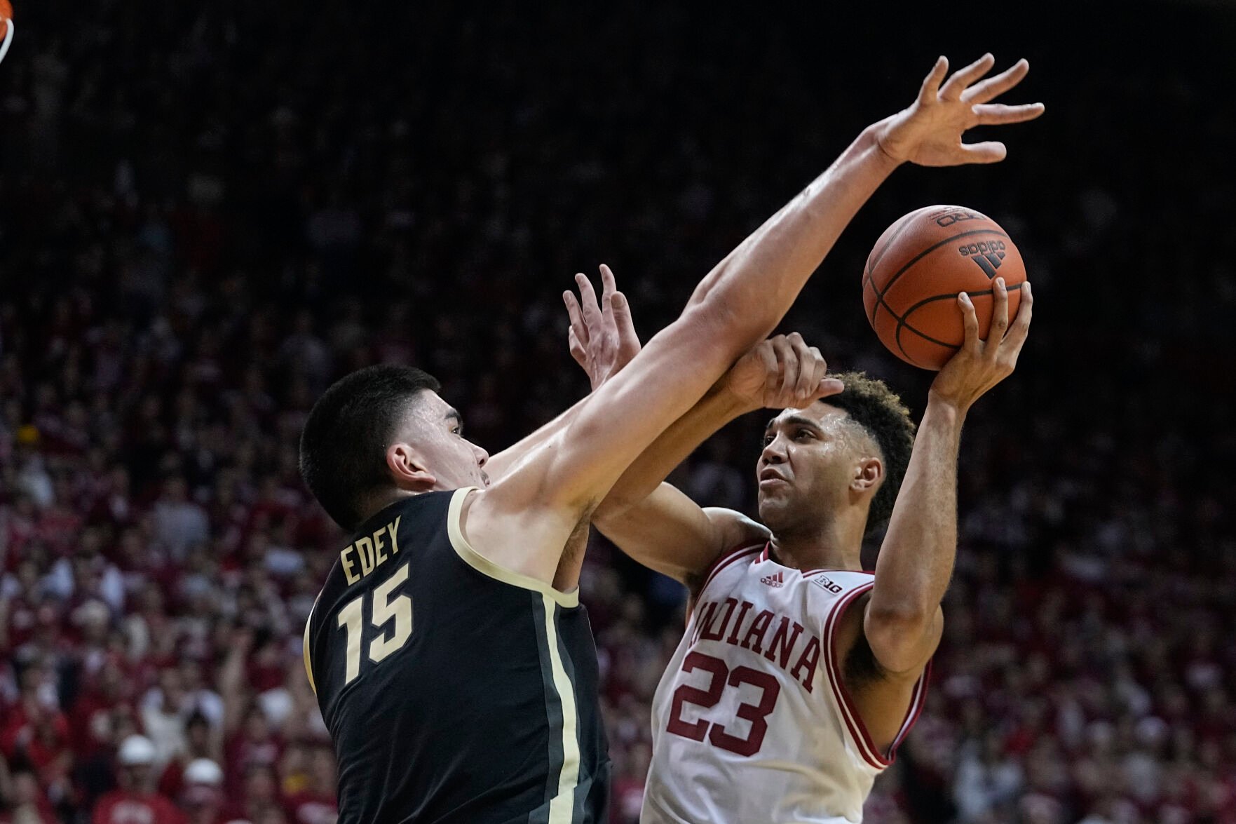 <p>Indiana's Trayce Jackson-Davis tries to shoot against Purdue's Zach Edey during their Feb. 4 game. Edey has become equally tough on defense as he is on offense.</p>
