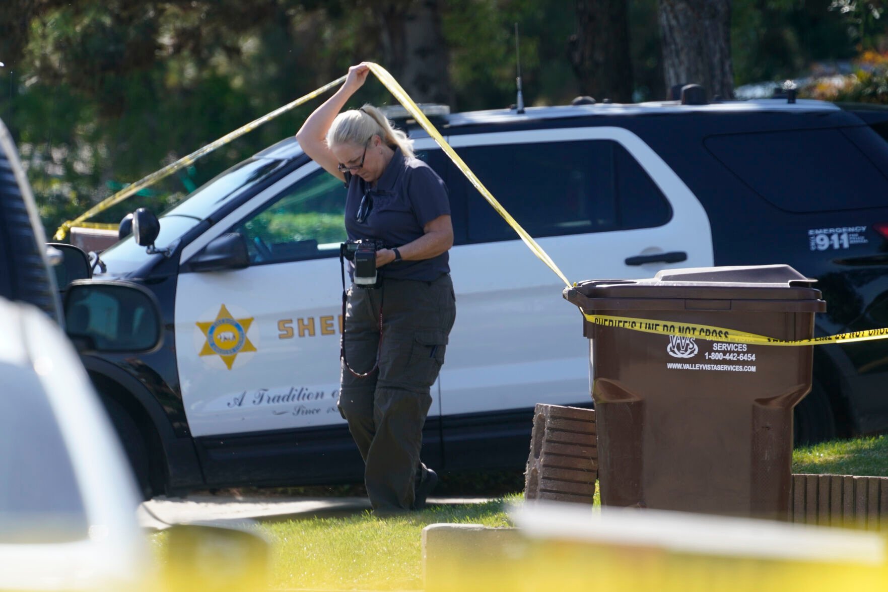<p>A forensic investigator leaves the home of Bishop David O'Connell in Hacienda Heights, Calif., Sunday, Feb. 19, 2023. </p>