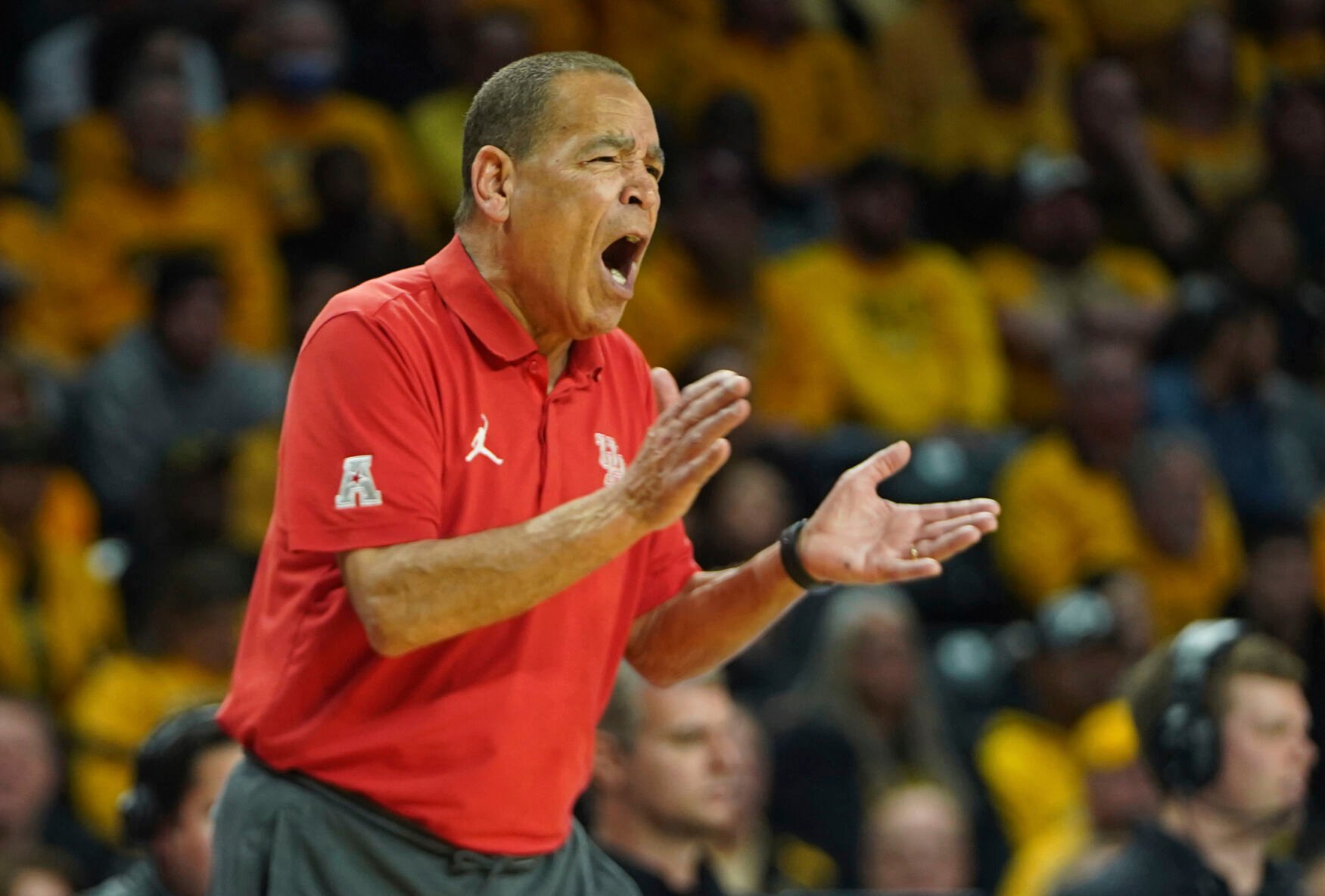 <p>Houston head coach Kelvin Sampson yells during the first half of Thursday's game against Wichita State in Wichita, Kan.</p>
