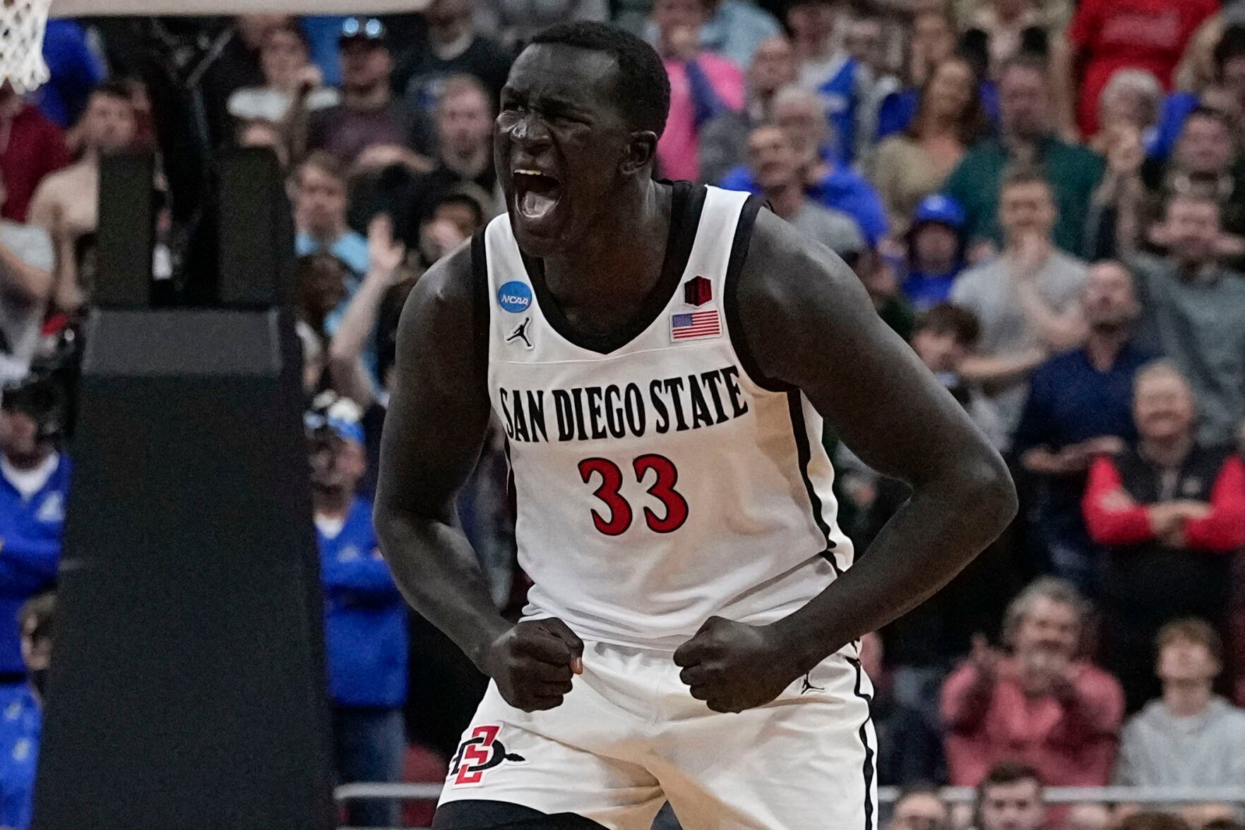 <p>San Diego State forward Aguek Arop celebrates beating Creighton after Sunday's Elite 8 game in Louisville, Ky.</p>