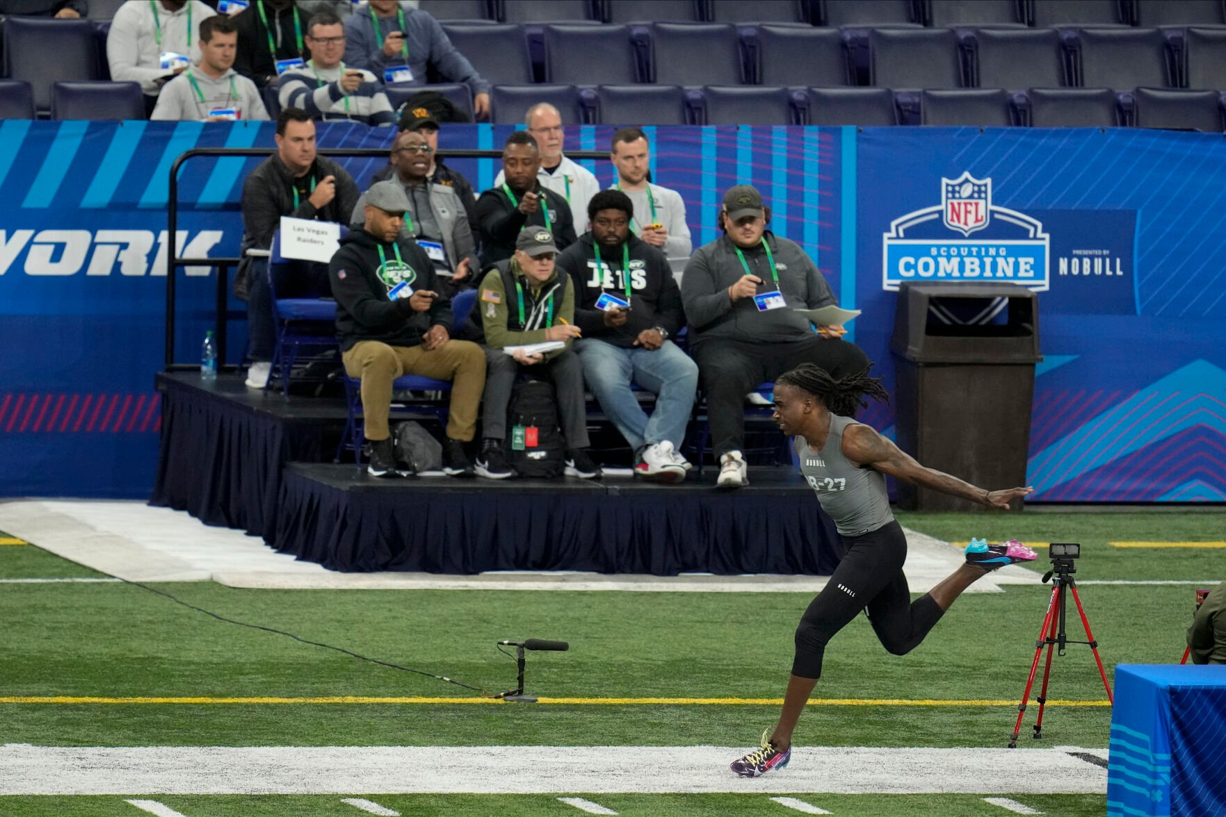 <p>Georgia defensive back Kelee Ringo runs the 40-yard dash at the scouting combine in Indianapolis.</p>