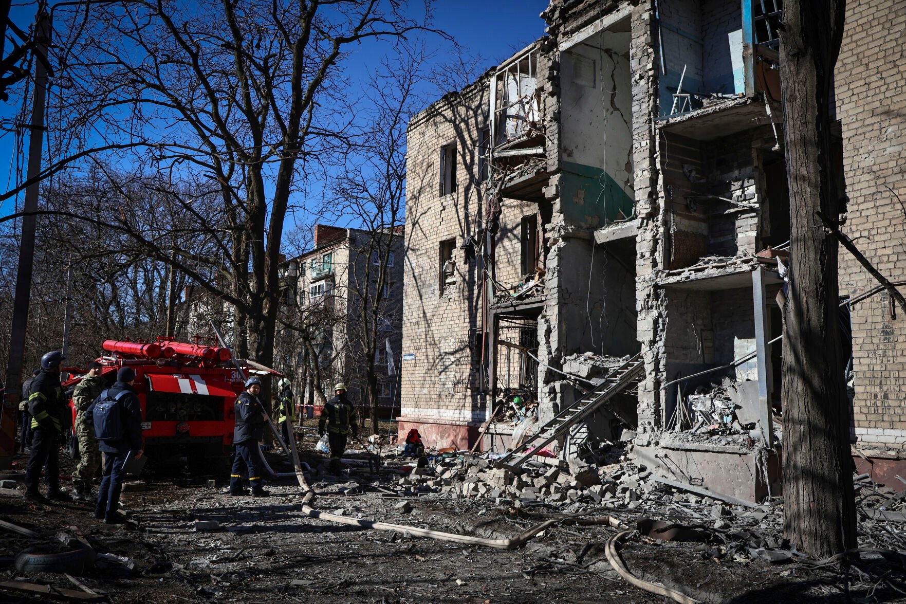 <p>Ukrainian Emergency Service rescuers work on a building damaged by shelling Tuesday in Kramatorsk, Donetsk region, Ukraine.</p>